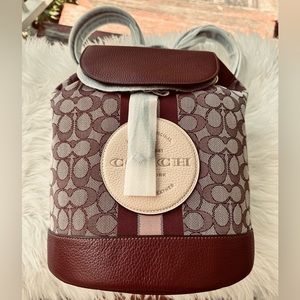 COACH Dempsey Drawstring Backpack In Signature Jacquard With Stripe And patch